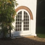Medina Joinery arched French Doors painted white