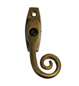 Monkey tail espag handle in Antique Brass