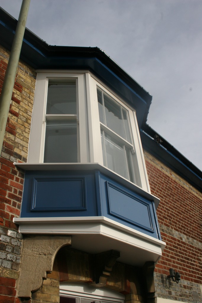 timber hardwood bay sliding sash window
