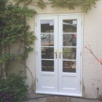 Hardwood French Doors painted white roof lantern