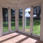 Double glazed wooden bi-fold doors french painted