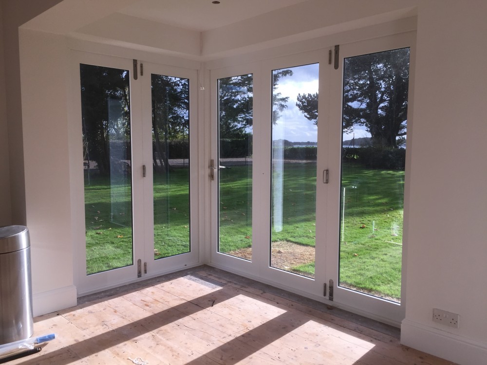 Double glazed wooden bi-fold doors french painted