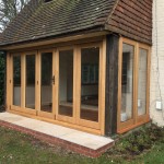 Oak Bifold sliding doors windows bi-fold