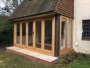 Oak Bifold sliding doors windows bi-fold
