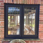 bespoke stained Oak casement window leaded glass