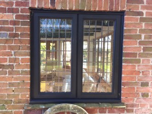 bespoke stained Oak casement window leaded glass