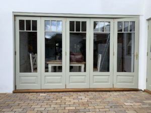 Accoya Bifold doors painted F&B French Grey