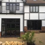 Timber wooden French doors patio black Surrey