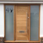 Oak door with glazed sidelights