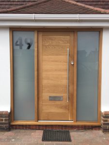 Oak door with glazed sidelights