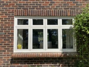 White Accoya timber flush casement window